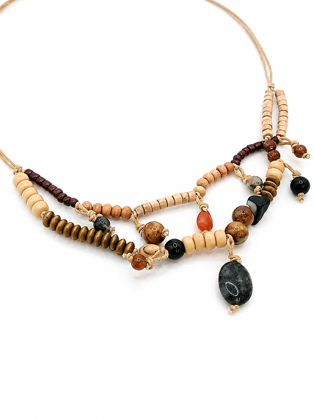 Handcrafted mixed bead necklace with natural cord, layered artisan details, earthy tones, and unique charm accents