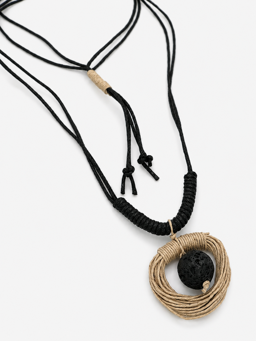 Handwoven Cord & Lava Stone Necklace with black adjustable cord, natural fiber pendant, and artisan wrapped details